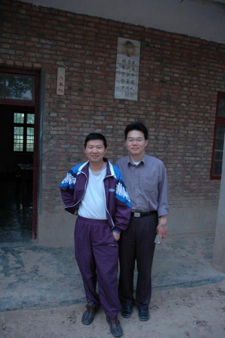 Button and Yang Haitao in front of the classroom on the CP