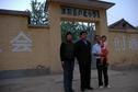 #7: Principle and Mrs Zhou and thier son in law in front of the school
