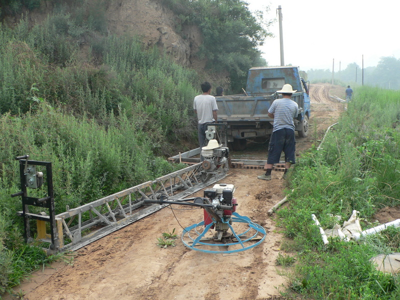 The first truckload of cement about to be poured