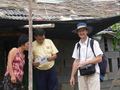 #9: Targ with the Wangs, owners of the confluence cornfield, in front of their house