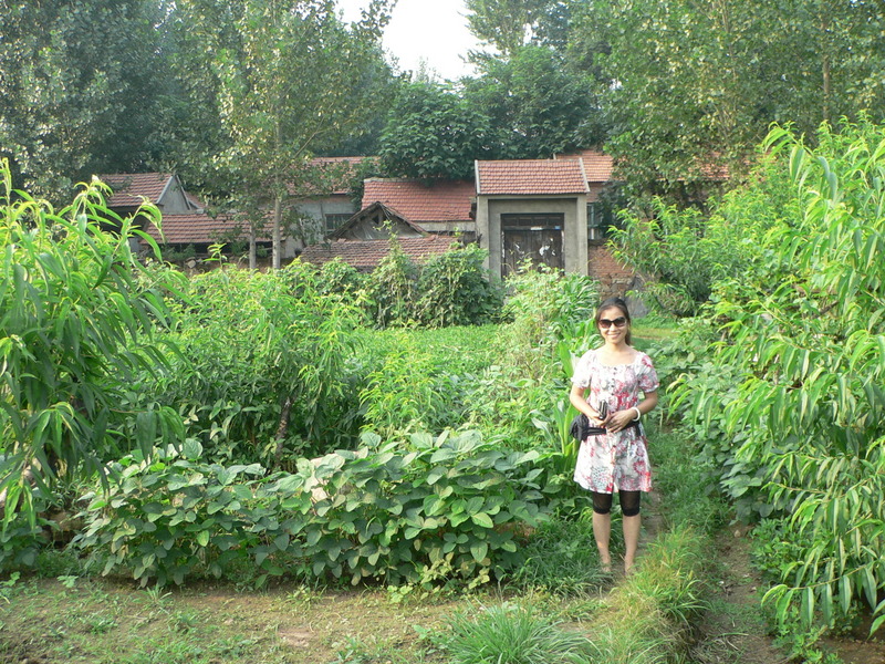Ah Feng in front of Dìyúgōu Village