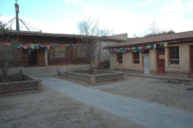 Dalai's birth place - The house on the right with the white door