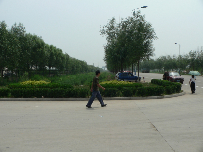 Looking east; Ah Feng and our taxi on the right