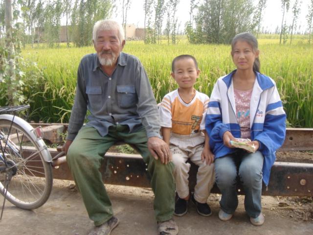 Grandpa Li and Grandson Li with visiting cousin