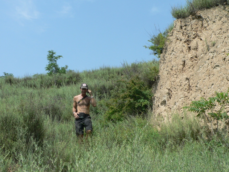 Peter conducting business on his mobile as he leaves the confluence