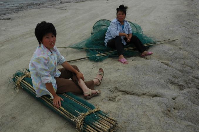 Resting on the fishing net on the bank of the Confluence Pond