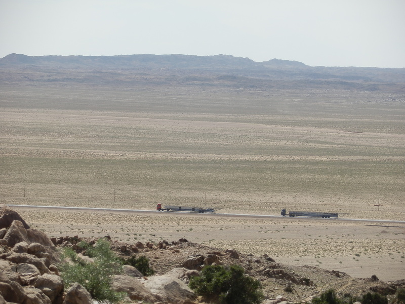 Long Trucks on Desert Road