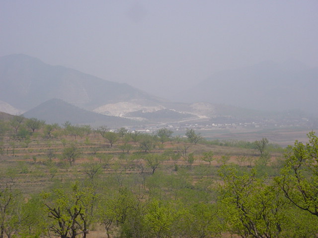 The orchards and hills I walked through to reach the confluence