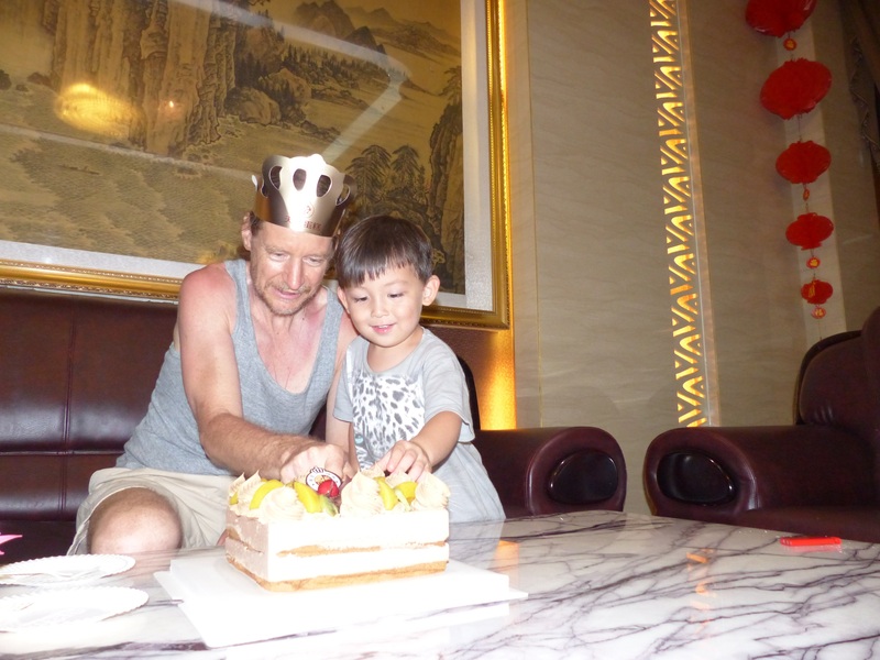 Targ and Andy cutting Targ's birthday cake