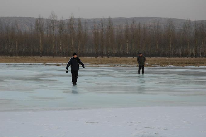 Walking acoss the river to reach the CP