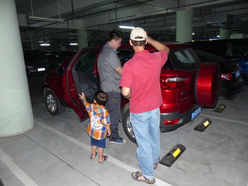 Andy's car seat being fitted