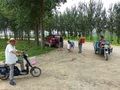 #10: Curious locals surround Peter and Andy