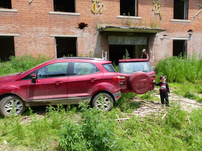 We parked in a clearing in front of an old abandoned school