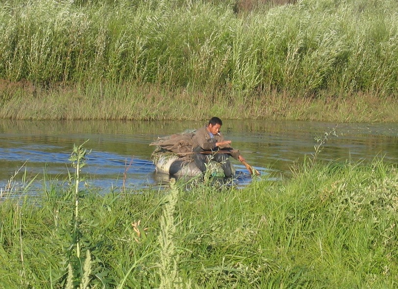 The Man in the Raft