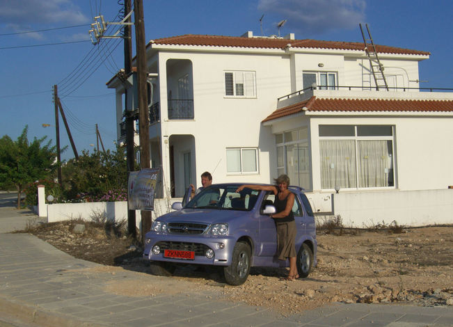 Margit & Herbert with the car parked on the CP