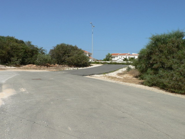 The location of the right confluence is next to the building at the back (on the other side of the road)