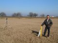 #4: Difference of opinion!  Mark Pautz at the yellow stake marking the official confluence position.