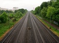 #8: The railway from the bridge. The point is below the arrow, just behind the trees