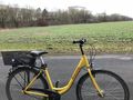 #9: Bicycle mode of transportation to the confluence with site in the background above the back tire.