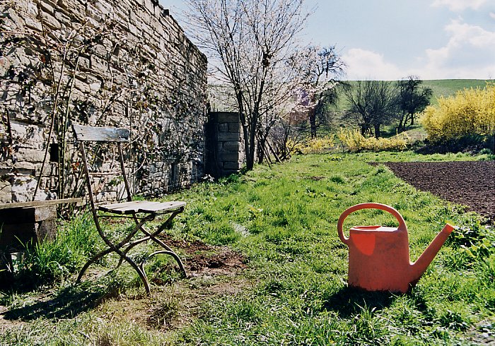 watering-can and garden-chair on CP, look S