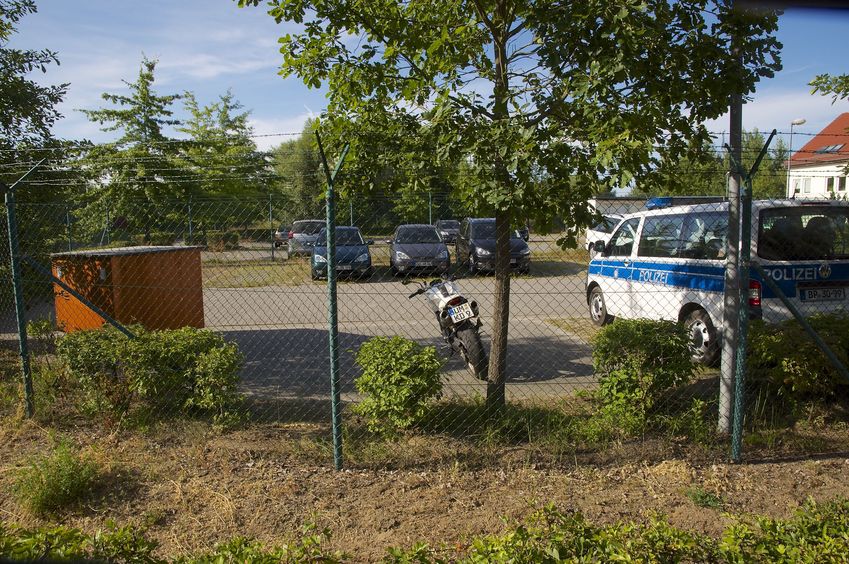 The confluence point lies 17 meters from this point - inside a police depot's parking lot (probably just beyond the motorcycle)