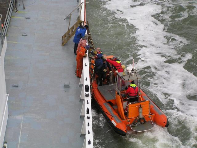 The pilot for Wilhelmshaven comes on board