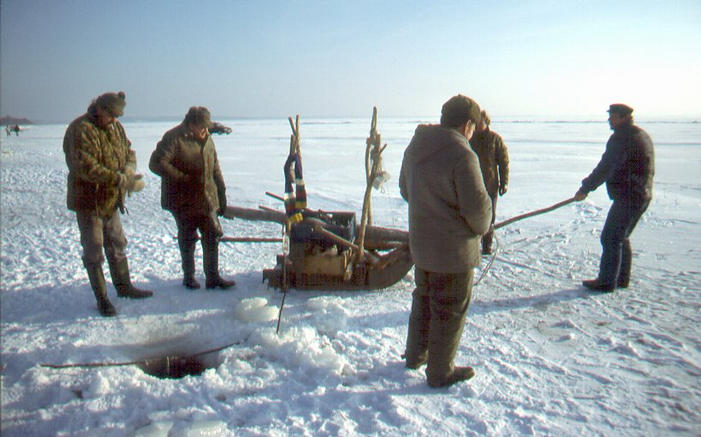 Some ice-fishers at another hole, view NE