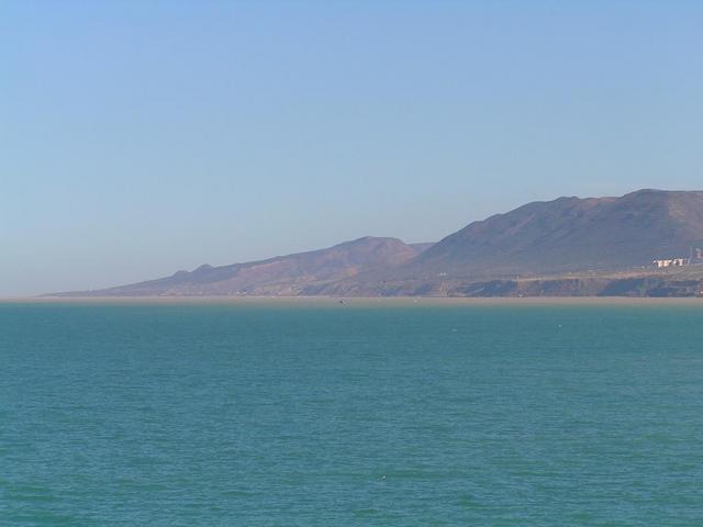 View ENE - The coast around Cap Ouillis seen from the Confluence