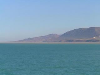 #1: View ENE - The coast around Cap Ouillis seen from the Confluence