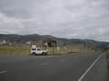 #8: Our car at the turnoff from the panamerican, the confluence is situated on the small hills in the background