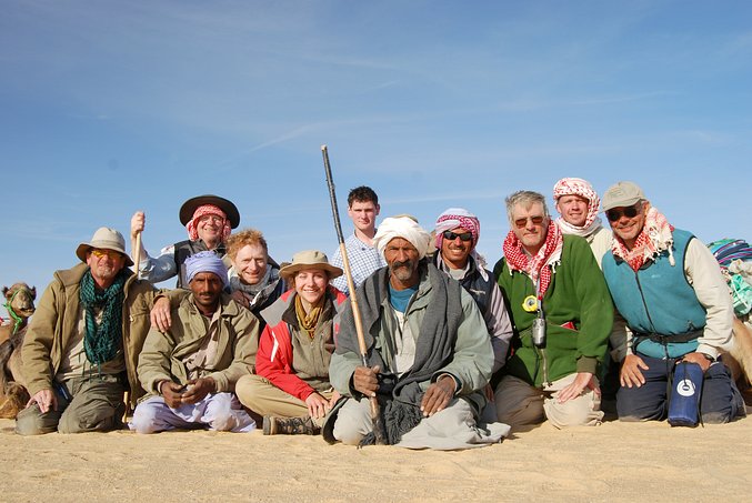 The team with camels in the background