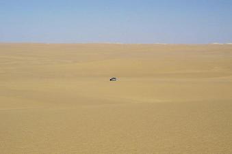 #1: View of the confluence area. Due to only sand dunes and harsh daylight, I took the scene with one car