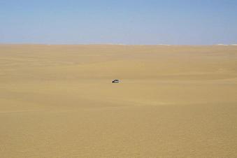 #1: View of the confluence area. Due to only sand dunes and harsh daylight, I took the scene with one car