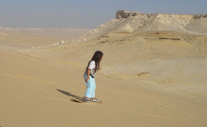 Alecia showing the older ones how to sandboard