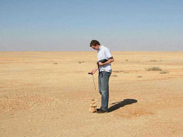 Julian checking the GPS at the point