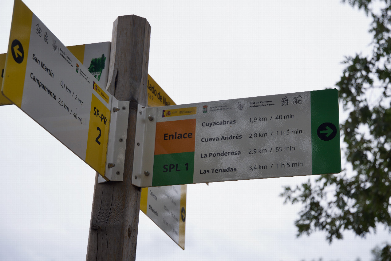 The sign (indicating a hiking path) where I parked, 800m West of the point