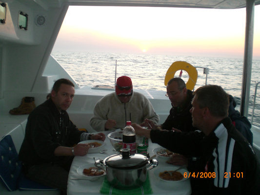 View west, The crew at dinner