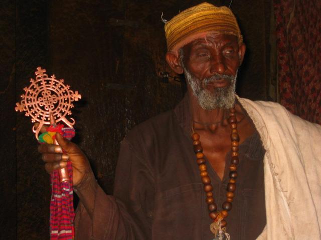 Priest in the rockchurch of Zoz Amba