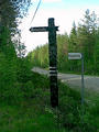 #6: Roadsigns pointing towards the spot.