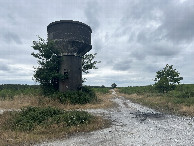 #8: The old water tower still stands at the intersection on the road.