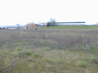 #1: View to the  North West showing the actual confluence (white mark)