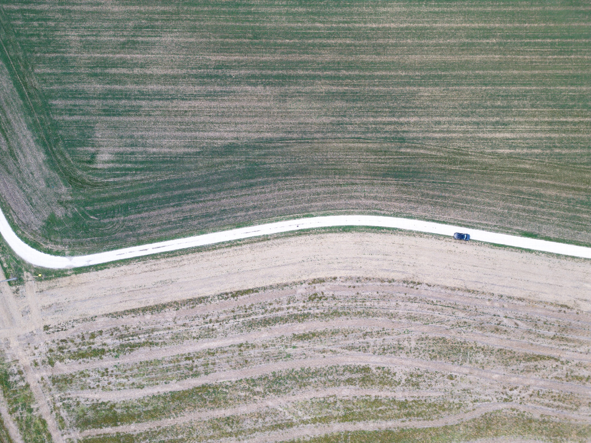 Looking down on the rural road (170m South of the point) from a height of 120m