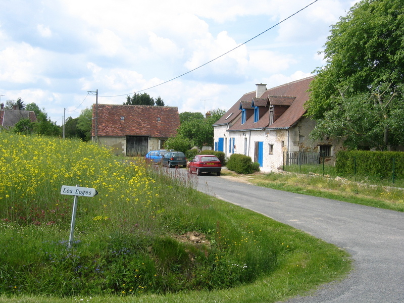 The nearby house signposted "Les Loges"