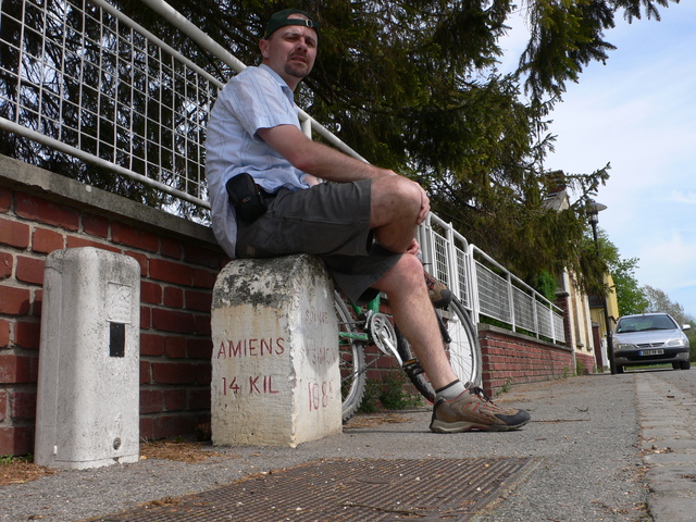 Having a rest on a distance marker on the Somme