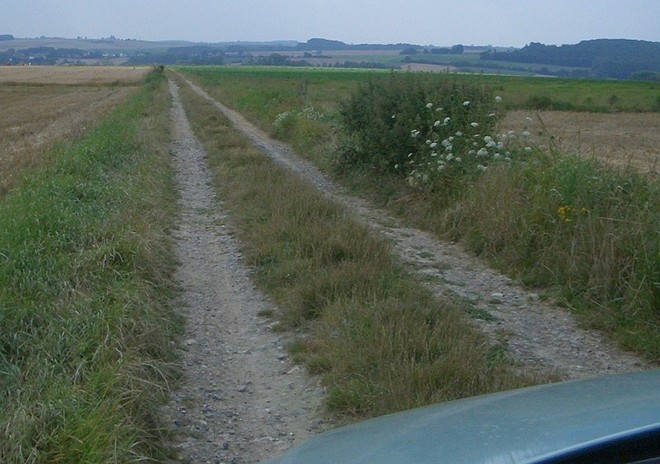 Such a dirt road cleans the bottom of the car