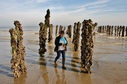 #9: Nat walking between the posts covered by mussels