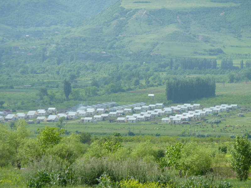 Refugee settlement seen from the "wrong" side of the river