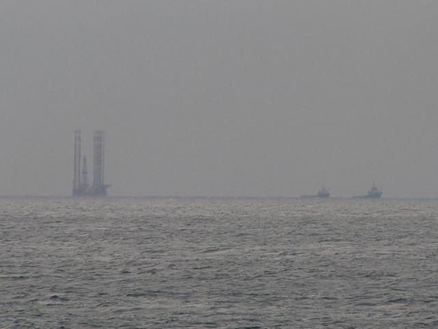 An oilrig is towed towards Europe