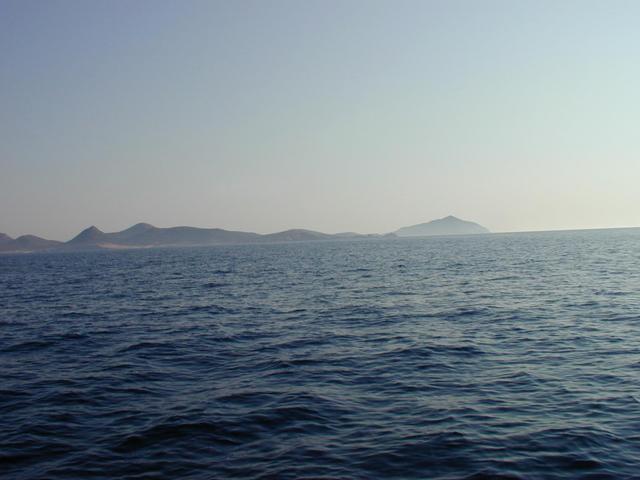 Despotikó and Strongyló (right back) islands (SW)