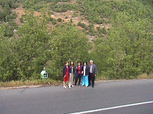 The team - the confluence is in the middle of the pic behind the trees about 30 meters below